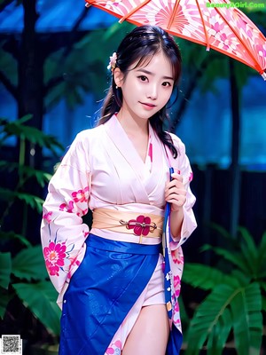 A woman in a kimono sitting on a chair under an umbrella.