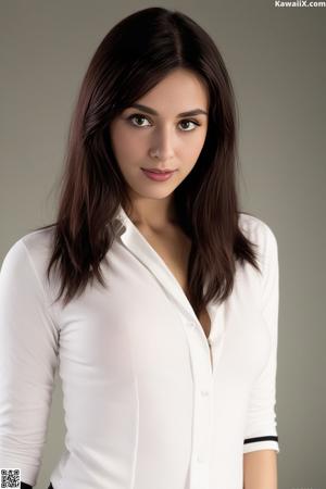 A woman in a brown dress posing for a picture.