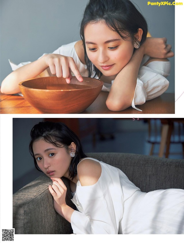 A woman laying on a couch next to a bowl.